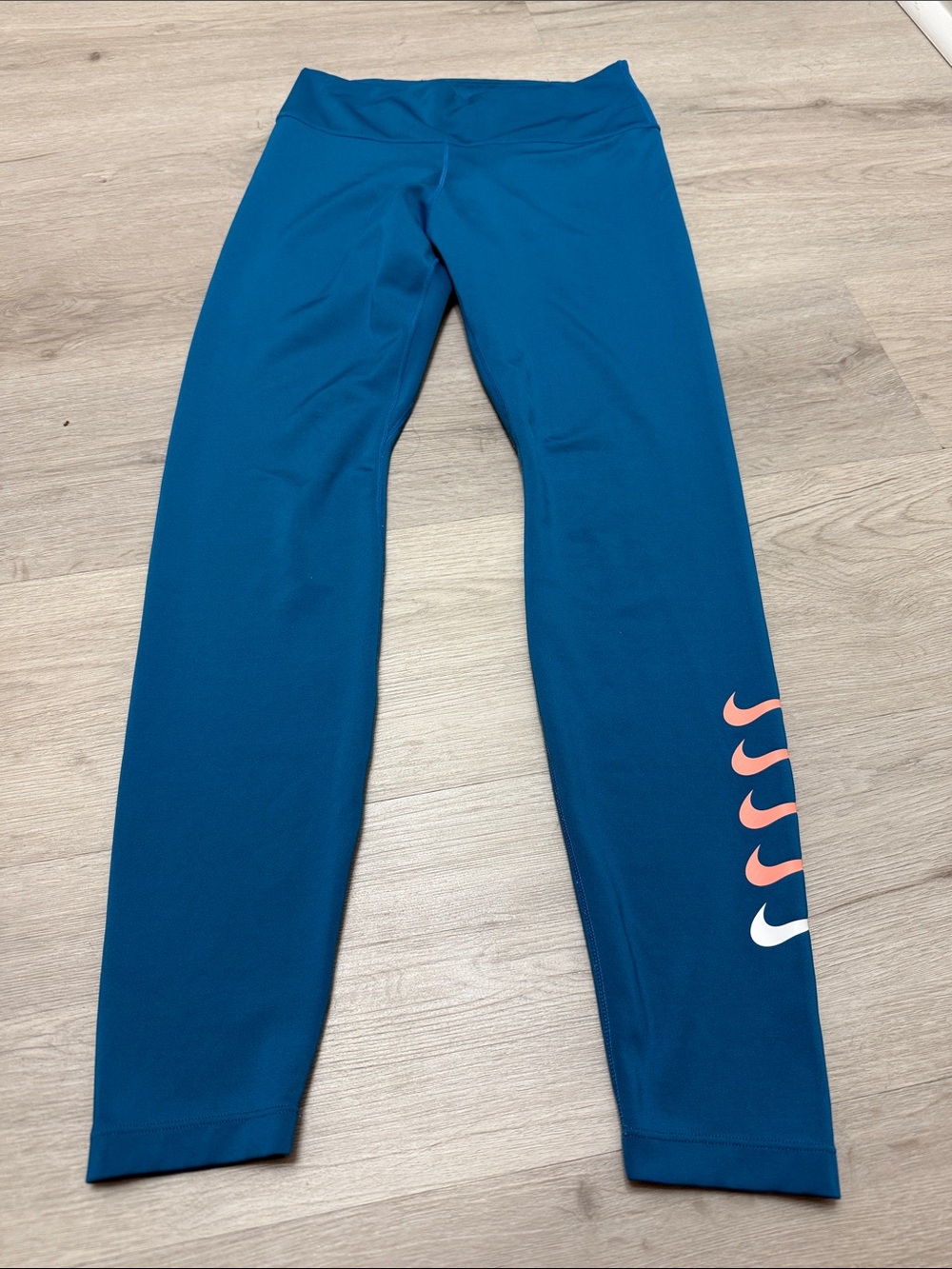 Nike Teal Leggings with Coral and White Swoosh Accents